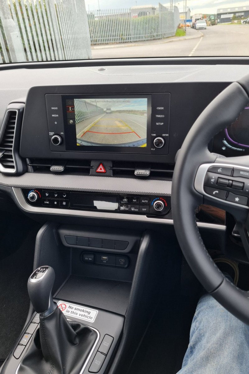 Internal drivers view of KIA Sportage including in-car electronics