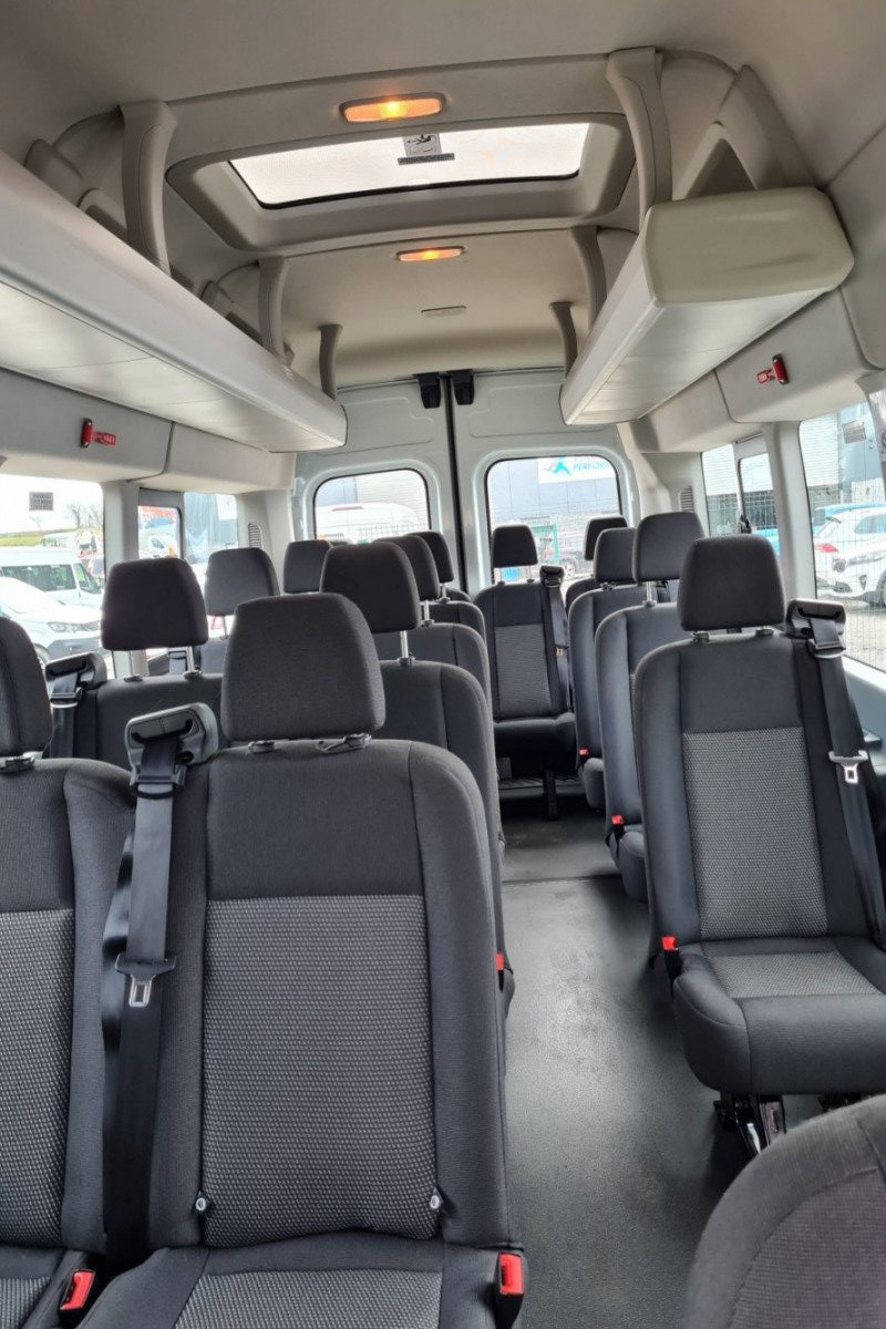 Interior view looking towards the back of 17 Seater minibus