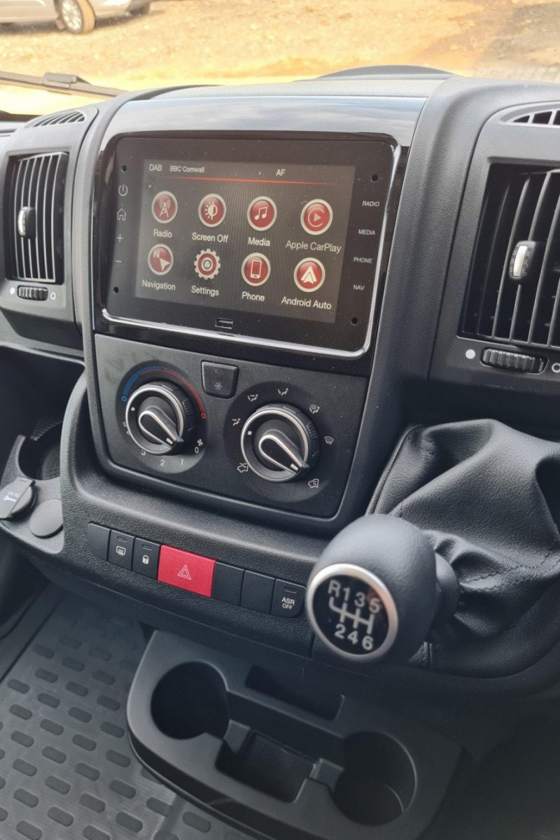 Drivers seat and interior console of LWB Van for hire in Bude, North Cornwall